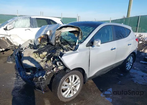 2013 Hyundai Tucson Limited z USA, uszkodzony, nr VIN KM8JU3AC5DU736588